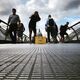 "yellow bag excited attention", London, England (Millenium Bridge) © Nadine Walz "yellow bag excited attention", London, England (Millenium Bridge)